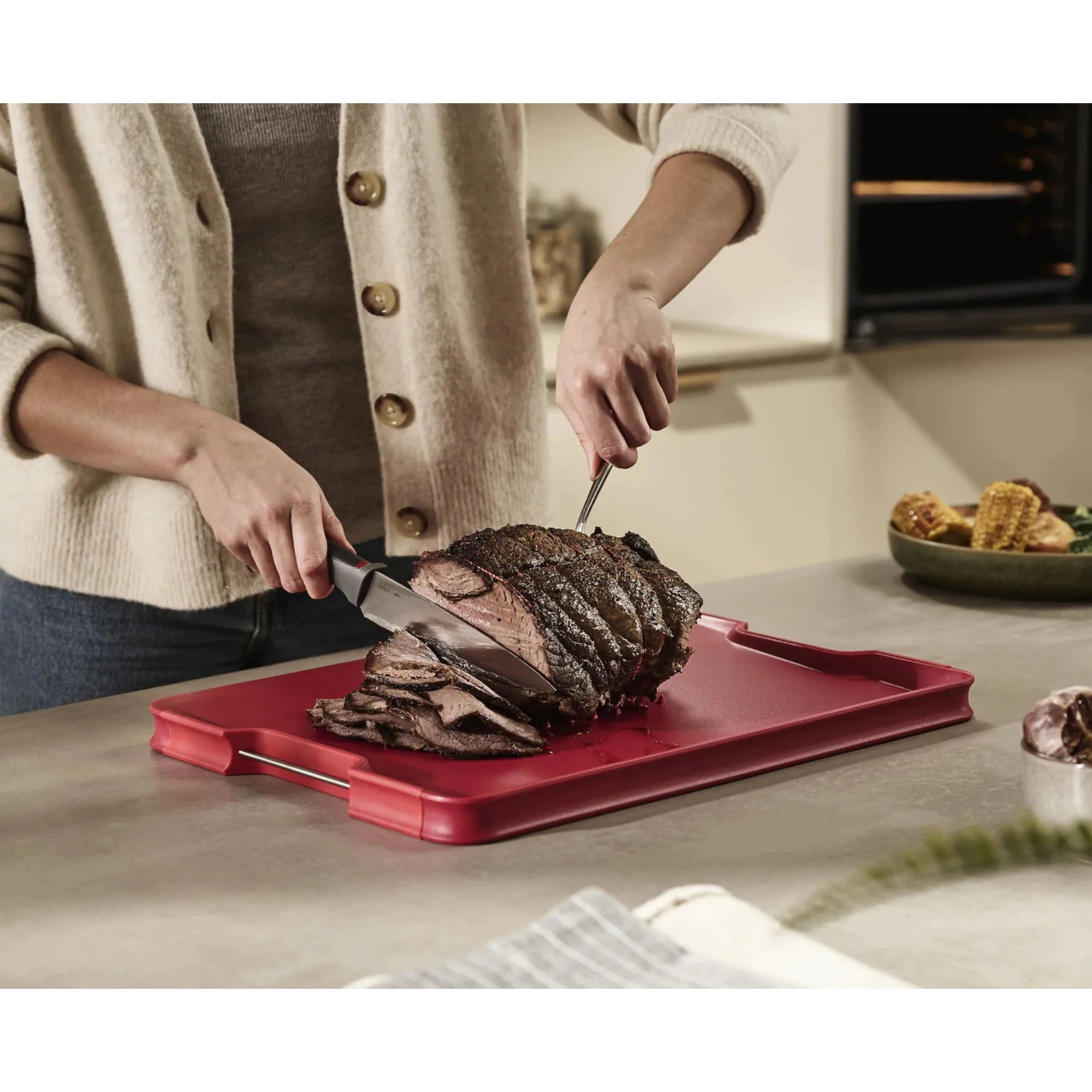 Joseph Joseph  Cut&Carve Plus Multi-function Chopping Board (2022) Large - Red